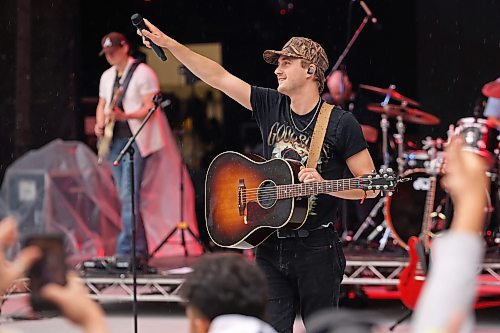 26062026
Canadian country musician Owen Riegling performs on the main stage with his band during light rain at Dauphin’s Countryfest 2026 on Friday evening.
(Tim Smith/The Brandon Sun)
