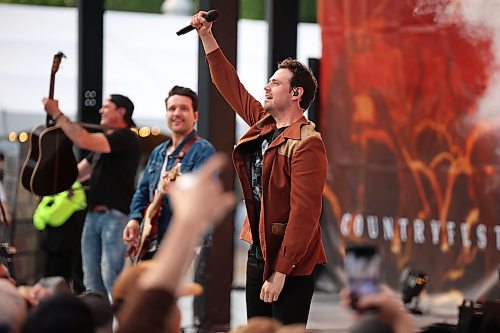 26062026
The Hunter Brothers rev up the large crowd at the main stage during Dauphin’s Countryfest 2026 on Friday evening. Tyler Hubbard headlined Friday evening’s main stage line-up.
(Tim Smith/The Brandon Sun)