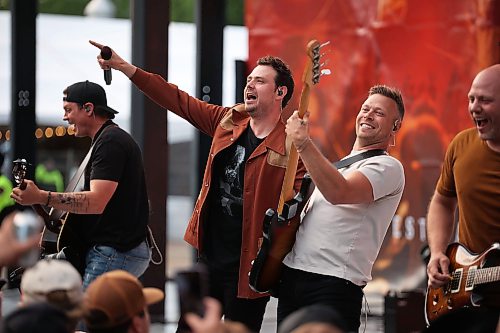 26062026
The Hunter Brothers rev up the large crowd at the main stage during Dauphin’s Countryfest 2026 on Friday evening. Tyler Hubbard headlined Friday evening’s main stage line-up.
(Tim Smith/The Brandon Sun)