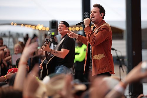 26062026
Ty Hunter of the Hunter Brothers revs up the large crowd at the main stage during Dauphin’s Countryfest 2026 on Friday evening. Tyler Hubbard headlined Friday evening’s main stage line-up. 
 (Tim Smith/The Brandon Sun)