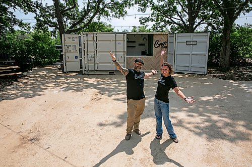 BROOK JONES/FREE PRESS
Cory Bartell (left) and Jennifer Mathieson, partners of a Cargo Bar at Southwood Circle, show their excitement while they are pictured at their newest location at the corner of Sidney Smith Street and Markham Road in Winnipeg, Man., Monday, June 29, 2026.