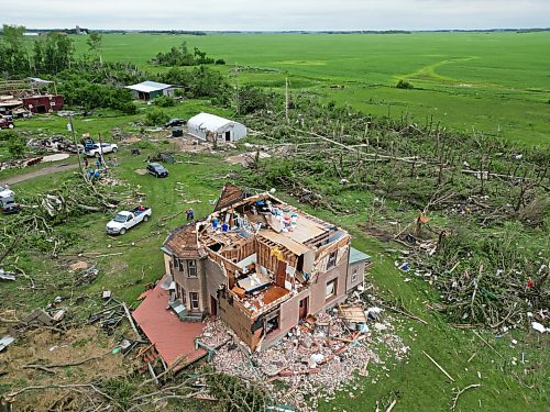 29062026
The devastation to the home and property belonging to Brian and Bernadine Brown south of Rossburn, Manitoba is visible on Monday after a powerful tornado hit the property on Sunday evening while Brian and Bernadine were inside. Their home, several other buildings on the property, vehicles and hundreds of trees were all heavily damaged by the tornado, but luckily escaped uninjured.
(Tim Smith/The Brandon Sun)