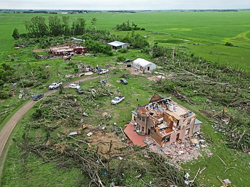 29062026
The devastation to the home and property belonging to Brian and Bernadine Brown south of Rossburn, Manitoba is visible on Monday after a powerful tornado hit the property on Sunday evening while Brian and Bernadine were inside. Their home, several other buildings on the property, vehicles and hundreds of trees were all heavily damaged by the tornado, but luckily escaped uninjured.
(Tim Smith/The Brandon Sun)
