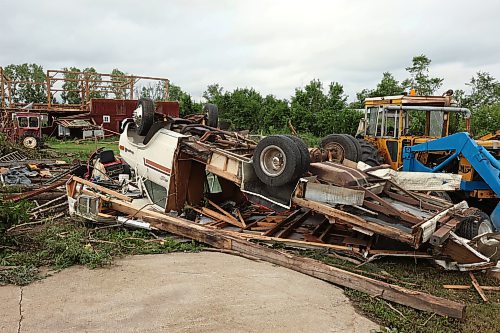 29062026
Damage to vehicles and buildings including a historic barn at the property belonging to Brian and Bernadine Brown south of Rossburn, Manitoba on Monday after a powerful tornado hit the property on Sunday evening while Brian and Bernadine were inside. Their home, several other buildings on the property, vehicles and hundreds of trees were all heavily damaged by the tornado, but luckily escaped uninjured. 
(Tim Smith/The Brandon Sun)