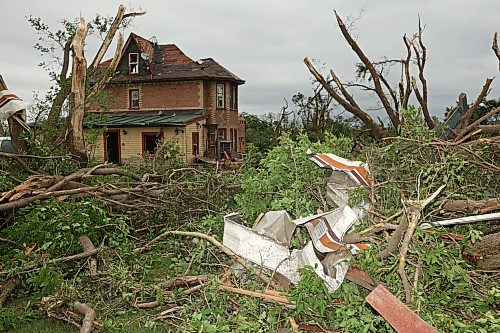 29062026
The home belonging to Brian and Bernadine Brown south of Rossburn, Manitoba on Monday after a powerful tornado hit the property on Sunday evening while Brian and Bernadine were inside. Their home, several other buildings on the property, vehicles and hundreds of trees were all heavily damaged by the tornado, but luckily escaped uninjured. 
(Tim Smith/The Brandon Sun)