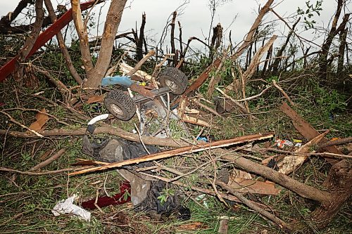 29062026
Damage to vehicles and buildings including a historic barn at the property belonging to Brian and Bernadine Brown south of Rossburn, Manitoba on Monday after a powerful tornado hit the property on Sunday evening while Brian and Bernadine were inside. Their home, several other buildings on the property, vehicles and hundreds of trees were all heavily damaged by the tornado, but luckily escaped uninjured.
(Tim Smith/The Brandon Sun)