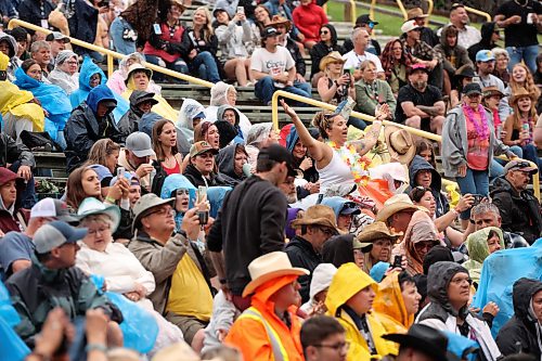 26062026
Fans brave light rain as Canadian country musician Owen Riegling performs on the main stage at Dauphin’s Countryfest 2026 on Friday evening.
(Tim Smith/The Brandon Sun)