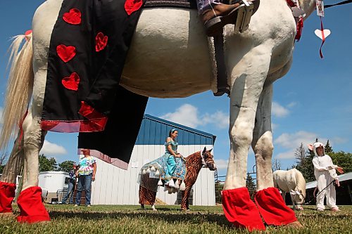Young competitors wait to take part in the miniature horse judging costume class at the Shoal Lake Ag Society Fair. The Shoal Lake Fair is one of six stops for the annual Milk Run, a six day long series of town fairs in close proximity. (Tim Smith/The Brandon Sun Files)