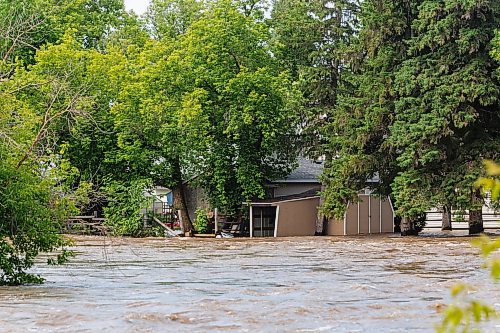 MIKE DEAL / FREE PRESS
The Swan River overflows its banks, flooding nearby homes in Swan River, MB.
Manitoba Premier Wab Kinew flew to Dauphin, MB and Swan River, MB on Thursday to get a first hand look at some of the flood damage and to meet with officials and victims who are still in the midst of dealing with the situation.
260702 - Thursday, July 02, 2026.