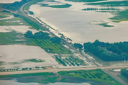 MIKE DEAL / FREE PRESS
Water covers farmland between Dauphin, MB, and Swan River, MB.
Manitoba Premier Wab Kinew flew to Dauphin, MB and Swan River, MB on Thursday to get a first hand look at some of the flood damage and to meet with officials and victims who are still in the midst of dealing with the situation.
260702 - Thursday, July 02, 2026.