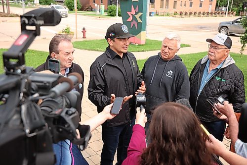02072026
Manitoba Premier Wab Kinew speaks to journalists outside Dauphin City Hall while touring the flood damage in the city on Thursday. (Tim Smith/The Brandon Sun)
