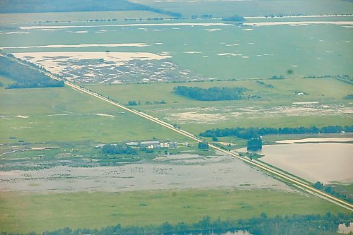 MIKE DEAL / FREE PRESS
Water covers farmland between Dauphin, MB, and Swan River, MB.
Manitoba Premier Wab Kinew flew to Dauphin, MB and Swan River, MB on Thursday to get a first hand look at some of the flood damage and to meet with officials and victims who are still in the midst of dealing with the situation.
260702 - Thursday, July 02, 2026.