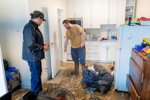 MIKE DEAL / FREE PRESS
Manitoba Premier Wab Kinew meets David McRae as he cleans out his apartment between shifts. David was at home when water started coming in through his front door.
Manitoba Premier Wab Kinew flew to Dauphin, MB and Swan River, MB on Thursday to get a first hand look at some of the flood damage and to meet with officials and victims who are still in the midst of dealing with the situation.
260702 - Thursday, July 02, 2026.