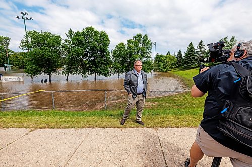 MIKE DEAL / FREE PRESS
Swan River Mayor Lance Jacobson in front of the flooded Jack Brown Memorial Field.
Manitoba Premier Wab Kinew flew to Dauphin, MB and Swan River, MB on Thursday to get a first hand look at some of the flood damage and to meet with officials and victims who are still in the midst of dealing with the situation.
260702 - Thursday, July 02, 2026.