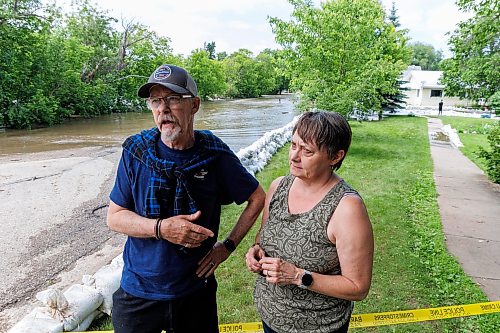 MIKE DEAL / FREE PRESS
Kevin and Pam Greig had to evacuate after the Swan River overflowed its banks and flooded their house before they were able to put up a ring of sandbags.
Manitoba Premier Wab Kinew flew to Dauphin, MB and Swan River, MB on Thursday to get a first hand look at some of the flood damage and to meet with officials and victims who are still in the midst of dealing with the situation.
260702 - Thursday, July 02, 2026.
