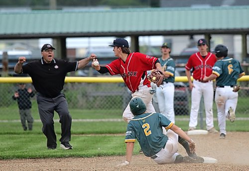 Rivers Comets Jase Wareham is called safe at second base on a close play against Hamiota's Jordan Edwards. (Thomas Friesen/The Brandon Sun)