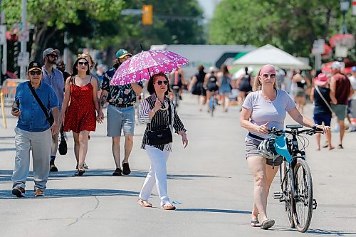 JOHN WOODS / FREE PRESS
People enjoy the first Sunday closing of Corydon Ave Sunday, July 5, 2026. Open Corydon sees the closure of Corydon Ave to vehicles between Lilac and Daly every Sunday this summer.

reporter: standup