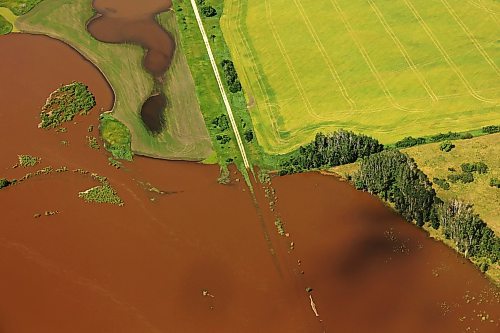 06072026
The Assiniboine River just west of Russell, Manitoba is swollen orders of magnitude beyond its usual banks, as seen from the air on Monday. That water is making it’s way downstream towards Brandon and eventually Winnipeg. 
(Tim Smith/The Brandon Sun)