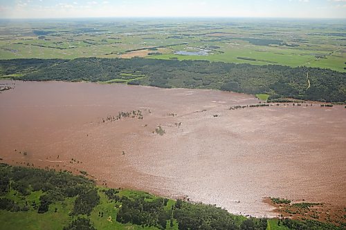06072026
The Assiniboine River just west of Russell, Manitoba is swollen orders of magnitude beyond its usual banks, as seen from the air on Monday. That water is making it’s way downstream towards Brandon and eventually Winnipeg.
(Tim Smith/The Brandon Sun)