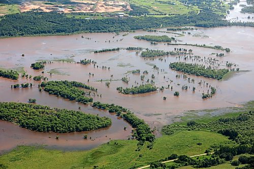 06072026
The Assiniboine River just west of Russell, Manitoba is swollen orders of magnitude beyond its usual banks, as seen from the air on Monday. That water is making it’s way downstream towards Brandon and eventually Winnipeg.
(Tim Smith/The Brandon Sun)