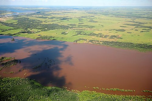06072026
The Assiniboine River just west of Russell, Manitoba is swollen orders of magnitude beyond its usual banks, as seen from the air on Monday. That water is making it’s way downstream towards Brandon and eventually Winnipeg. 
(Tim Smith/The Brandon Sun)