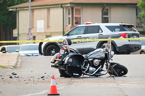 MIKE DEAL / WINNIPEG FREE PRESS
Winnipeg Police investigate a MVC between a white van and a motorcycle at Talbot Avenue and Levis Street. Talbot is closed between Brazier and Stadacona streets while they investigate.
230614 - Wednesday, June 14, 2023
