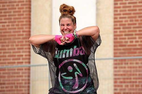 07072026
Zumba instructor Sandra Fernández leads participants in a free Zumba class in Princess Park along with Downtown Ambassadors on Tuesday. Fernández and fellow instructor Shawna Sherb-Jones led the class together. The classes will continue throughout the summer on Tuesdays from 11:00 AM until noon. The classes are organized by The Brandon Neighbourhood Renewal Corporation and Rosser &amp; Around. (Tim Smith/The Brandon Sun)