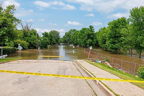 MIKE DEAL / FREE PRESS
Seventh Avenue North in Swan River, MB is completely flooded.
Manitoba Premier Wab Kinew flew to Dauphin, MB and Swan River, MB on Thursday to get a first hand look at some of the flood damage and to meet with officials and victims who are still in the midst of dealing with the situation.
260702 - Thursday, July 02, 2026.