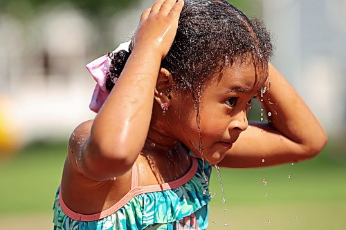 09072026
Water drips from four-year-old Juliana Shepherd as she plays in the cool water at the Stanley Park spray park with family and friends on a hot Thursday afternoon. (Tim Smith/The Brandon Sun)