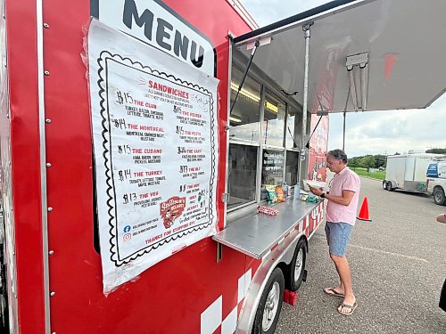 Sandwiches are on the menu at Sullivan’s Delights food truck, seen here outside the Christie’s Office Plus store on Richmond Avenue on Thursday.  (Matt Goerzen/The Brandon Sun)