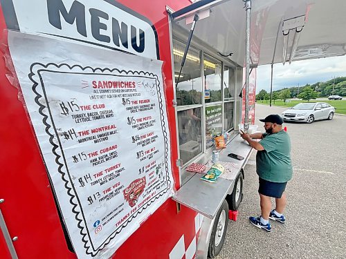 Sandwiches are on the menu at Sullivan’s Delights food truck, seen here outside the Christie’s Office Plus store on Richmond Avenue on Thursday. (Matt Goerzen/The Brandon Sun)