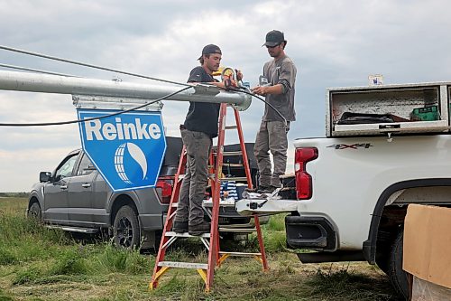 09072026
Workers with Ful-Flo Industries set-up new pivot irrigation equipment in a field at Deerboine Colony west of Brandon to replace equipment that was damaged in a spring storm earlier this year.  (Tim Smith/The Brandon Sun)