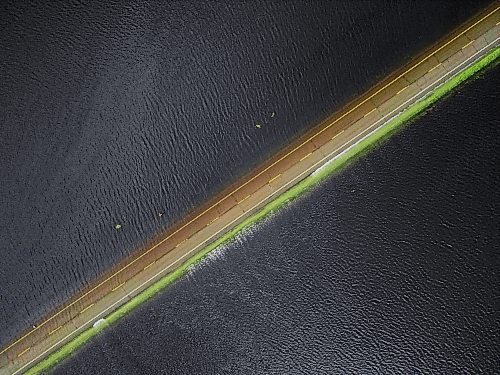 09072026
Water from the swollen Assiniboine River covers Highway 21 south of Sioux Valley Dakota Nation on Thursday. The section of the highway through the river valley is currently closed due to the flooding.
(Tim Smith/The Brandon Sun)