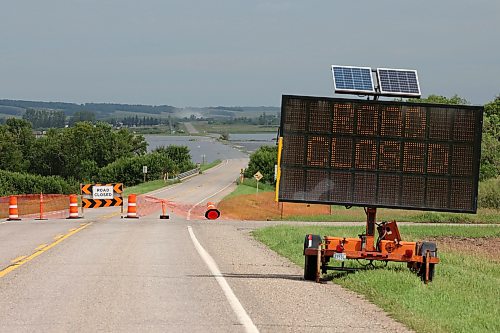 09072026
Barriers block access to Highway 21 at the Assiniboine River south of Sioux Valley Dakota Nation on Thursday after flood waters from the rising Assiniboine covered the road just north of the river.
(Tim Smith/The Brandon Sun)