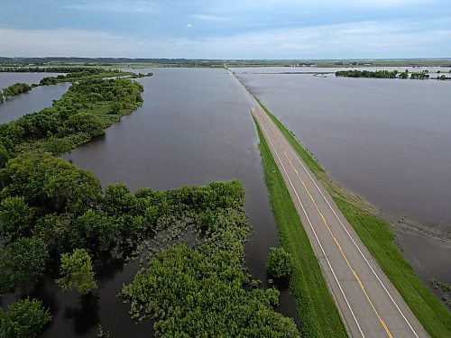 09072026
Water from the swollen Assiniboine River covers Highway 21 south of Sioux Valley Dakota Nation on Thursday. The section of the highway through the river valley is currently closed due to the flooding.
(Tim Smith/The Brandon Sun)