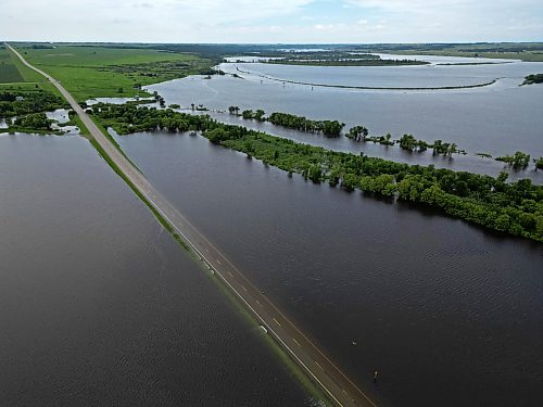 09072026
Water from the swollen Assiniboine River covers Highway 21 south of Sioux Valley Dakota Nation on Thursday. The section of the highway through the river valley is currently closed due to the flooding. 
(Tim Smith/The Brandon Sun)