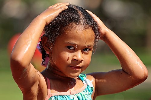 09072026
Water drips from four-year-old Juliana Shepherd as she plays in the cool water at the Stanley Park spray park with family and friends on a hot Thursday afternoon. (Tim Smith/The Brandon Sun)