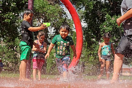 09072026
A group of siblings and friends play in the cool water at the Stanley Park spray park on a hot Thursday afternoon. (Tim Smith/The Brandon Sun)