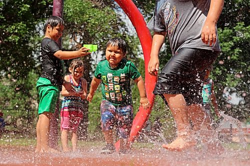 09072026
A group of siblings and friends play in the cool water at the Stanley Park spray park on a hot Thursday afternoon. (Tim Smith/The Brandon Sun)