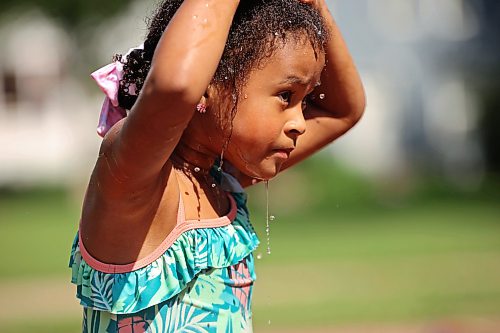 09072026
Water drips from four-year-old Juliana Shepherd as she plays in the cool water at the Stanley Park spray park with family and friends on a hot Thursday afternoon. (Tim Smith/The Brandon Sun)