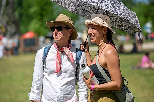 BROOK JONES/FREE PRESS
Folk Fest goers Stephen Kurz (left), 32, and Luizu Seiler, 33, who are visiting from the Netherlands, are pictured at the 51st edition of the Winnipeg Folk Festival at Birds Hill Provincial Park in Manitoba on Sunday, July 12, 2026.