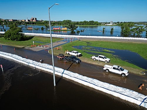12072026
Dinsdale Park in Brandon is almost completely submerged by flood water on Sunday, while super-sandbags mostly protect First Street North from the floodwater. . (Tim Smith/The Brandon Sun)
default