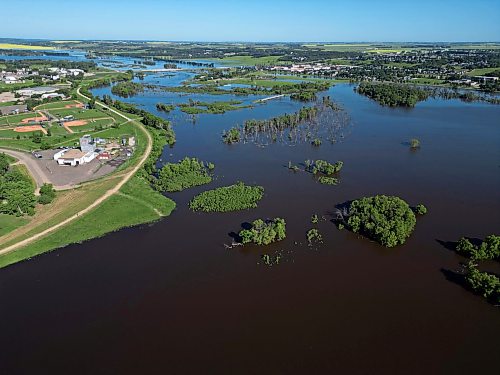 12072026
Flood water from the Assiniboine River much of the land adjacent to the river through Brandon on Sunday. (Tim Smith/The Brandon Sun)