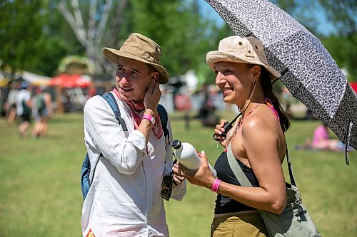 BROOK JONES/FREE PRESS
Folk Fest goers Stephen Kurz (left), 32, and Luizu Seiler, 33, who are visiting from the Netherlands, are pictured at the 51st edition of the Winnipeg Folk Festival at Birds Hill Provincial Park in Manitoba on Sunday, July 12, 2026.