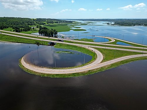 13072026
Grand Valley Road and on-and-off-ramps for the Trans Canada Highway sit submerged in flood water from the swollen Assiniboine River on Monday.
(Tim Smith/The Brandon Sun)