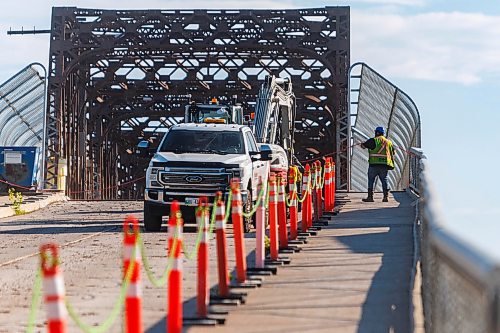 MIKE DEAL / FREE PRESS
Work continues on the removal of the Arlington Street Bridge.
260714 - Tuesday, July 14, 2026.
