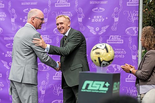 MIKAELA MACKENZIE / FREE PRESS
Mayor Scott Gillingham (left) shakes hands with team co-founders Rob Gale and Desiree Scott at the official announcement of the Northern Super Leagueճ expansion to Winnipeg on Tuesday, July 14, 2026.
For Gabby story.
Free Press 2026