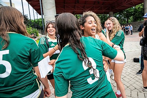 MIKAELA MACKENZIE / FREE PRESS
Northern Super Leagueճ Winnipeg expansion team co-founder Desiree Scott hugs FC Northwest League U17 girls players at The Forks on Tuesday, July 14, 2026.
For Gabby story.
Free Press 2026