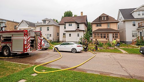 MIKE DEAL / FREE PRESS
WFPS crews work on putting out a fire at a house at 880 Alverstone Street Wednesday morning.
Reporter: Tyler Searle
260715 - Wednesday, July 15, 2026.