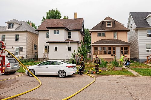 MIKE DEAL / FREE PRESS
WFPS crews work on putting out a fire at a house at 880 Alverstone Street Wednesday morning.
Reporter: Tyler Searle
260715 - Wednesday, July 15, 2026.